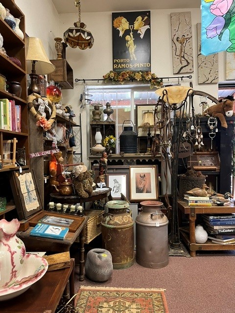 Vintage decor, artwork, and collectibles at the RAIN Rescue thrift store