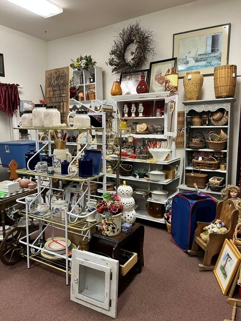 Kitchenware, baskets, and home goods on display